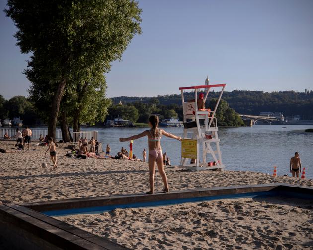 Ukrainian children enjoying the summer season on the banks of the Dnieper River on Hydropark Island, Kyiv, August 13, 2023.