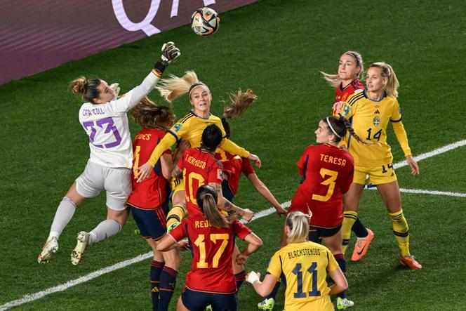 Spain's goalkeeper Catalina Coll jumps to clear the ball during the 2023 Women's World Cup semi-final football match between Spain and Sweden at Eden Park in Auckland on August 15, 2023. 