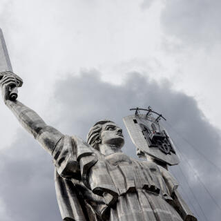 The statue of the Motherland during work to replace the Soviet emblems of the sickle and shield hammer with the Tryzoub - the trident that has become the official symbol of Ukraine, in Kiev, Ukraine, August 12, 2023.