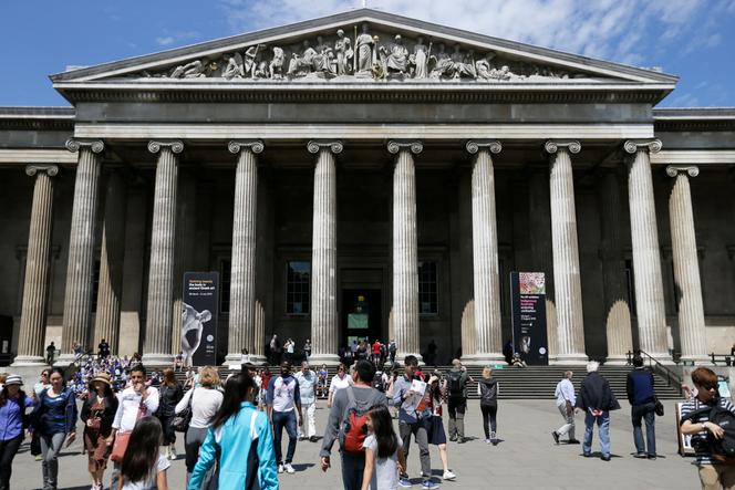 Visitors walk outside the British Museum in Bloomsbury, London, Friday, June 26, 2015.