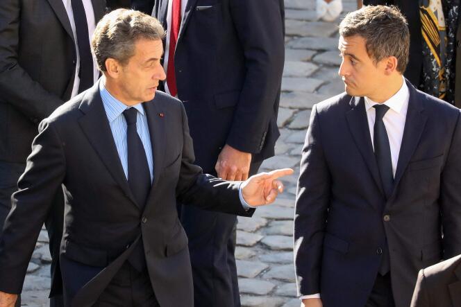 Nicolas Sarkozy L’ancien président français Nicolas Sarkozy et Gérald Darmanin, alors ministre de l’action et des comptes publics, lors de l’hommage national à Charles Aznavour aux Invalides, à Paris, le 5 octobre 2018.