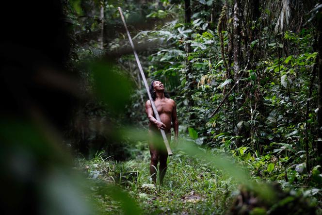 Kominta, a Waorani Indigenous man, goes hunting in the Waorani Community of Bameno, Ecuador, on July 29, 2023. 