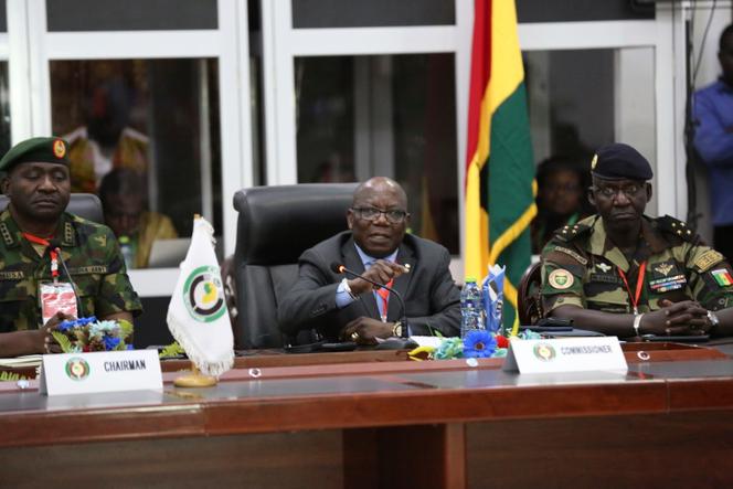 ECOWAS commissioner Abdel-Fatau Musah, centre, speaks during a press briefing following the Extraordinary Meeting of the ECOWAS Committee of Chiefs of the Defence Staff, in Accra, Ghana, Friday, Aug. 18, 2023.