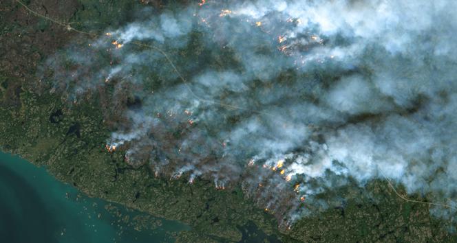 Satellite view of fires near Yellowknife, the capital of Canada's Northwest Territories, on August 16, 2023.