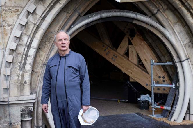 A picture taken on June 16 2021 in Paris, shows Jean-Louis Georgelin, a general leading the restoration efforts of Notre-Dame de Paris' cathedral during a visit of the monument ravaged two years ago by a fire.