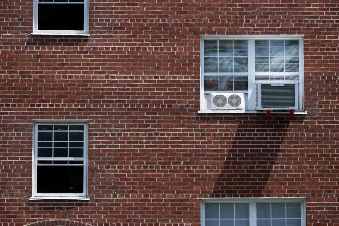 A window air conditioner in Arlington, Virginia, USA on July 10, 2023.  