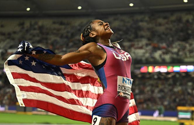 Sha'carri Richardson of the US celebrates winning gold.