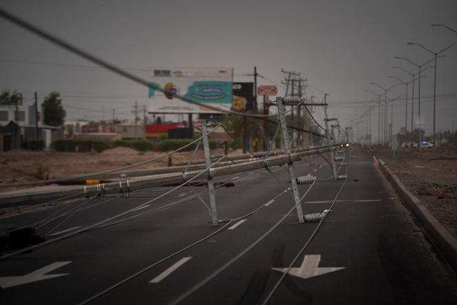 Collapsed power towers are pictured as Tropical Storm Hilary hits Baja California state, in Mexicali, Mexico, August 20, 2023.