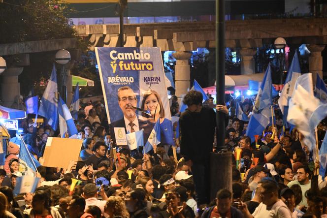 Supporters of Bernardo Arevalo celebrate their victory in the second round of the presidential election, Guatemala City, August 20, 2023.