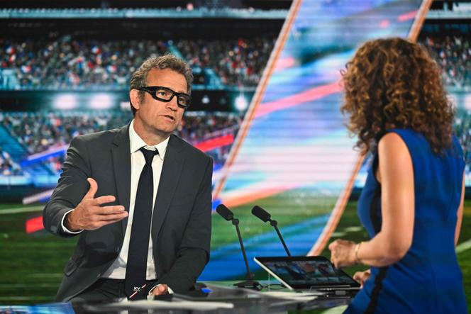 France's head coach Fabien Galthié speaks with French TV host and journalist Marie-Sophie Lacarrau ahead of announcing France's Squad for the 2023 Rugby World Cup on French television, on August 21, 2023.
