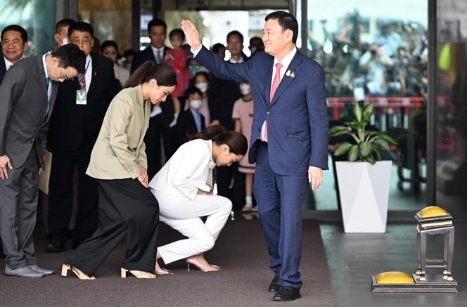 Former Prime Minister Thaksin Shinawatra upon his arrival at Bangkok's Don Muang airport, August 22, 2023.