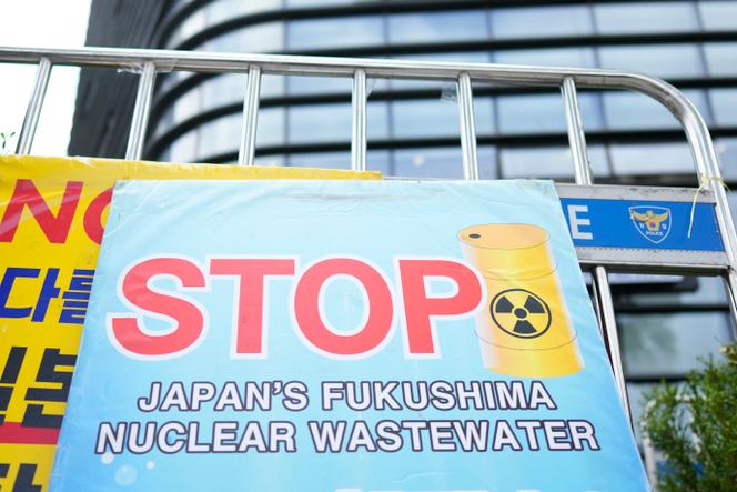 A sign is placed outside of a building which houses Japanese Embassy, in Seoul, South Korea, August 22, 2023. 