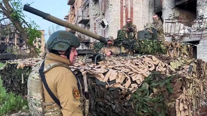 Prigozhin with Wagner fighters in Bakhmut, Ukraine, on May 25, 2023.