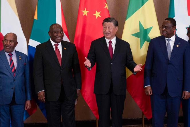 Comoros President Azali Assoumani, South African President Cyril Ramaphosa, Chinese President Xi Jinping and Senegalese President Macky Sall on the last day of the BRICS summit in Johannesburg, August 24, 2023. 