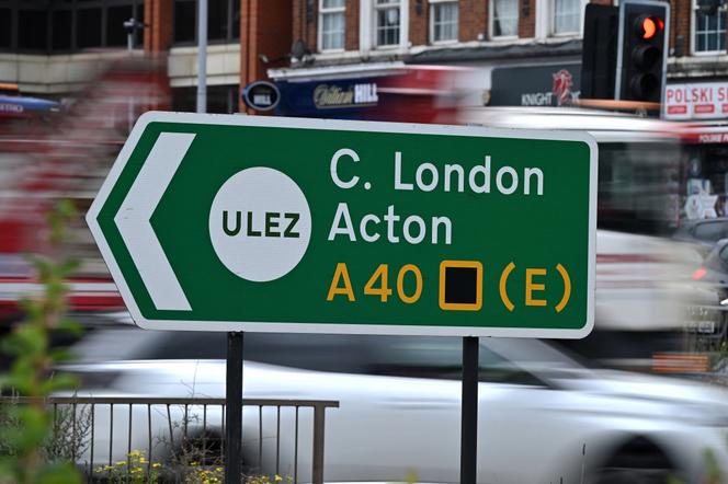 A sign indicating the Ultra Low Emission Zone (ULEZ) near Hanger Lane, West London, July 22, 2023.