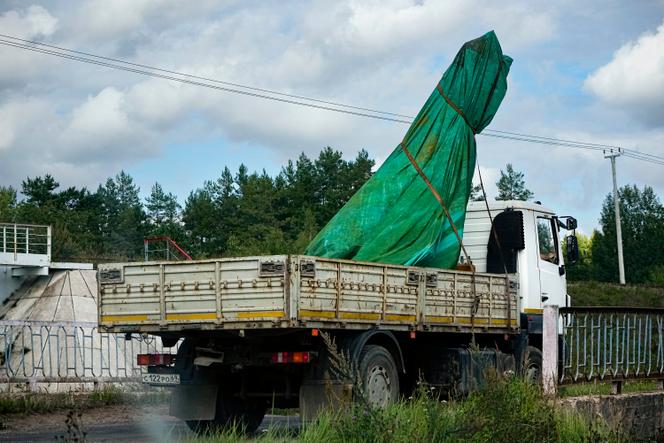 A truck carries a part of a private jet crashed near the village of Kuzhenkino, Tver region, Russia, Friday, August 25, 2023.