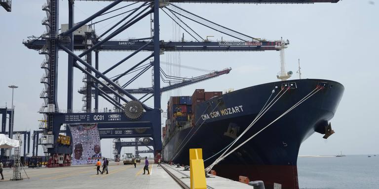 Sunday Alamba/AP/SIPA / Sunday Alamba/AP/SIPA A Shipping container is seen at the Lekki deep seaport before it was commission by Nigeria's President, Muhammadu Buhari, in Lagos, Nigeria, Monday, Jan. 23, 2023. Nigeria's President Muhammadu Buhari on Monday commissioned a Chinese-built and -funded $1.5 billion deep seaport in the commercial hub of Lagos with authorities optimistic the project would help grow the West African nation's ailing economy. (AP Photo/Sunday Alamba)/XSA106/23023778633552-0/JAN. 23, 2023, PHOTO/2301241115