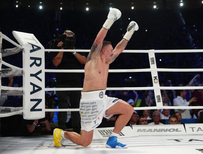 Victorious, Ukrainian Oleksandr Usyk retains his three heavyweight world champion titles against Britain's Daniel Dubois at the Tarczynski Arena, in Wroclaw, Poland, on August 26, 2023.