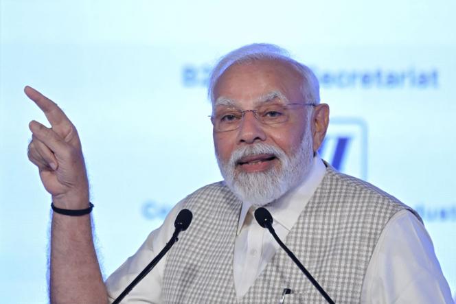 India's Prime Minister Narendra Modi addresses the gathering on the third day of the three-day B20 Summit in New Delhi on August 27, 2023. (Photo by Sajjad HUSSAIN / AFP)