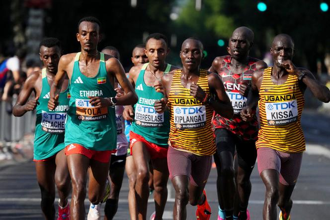 Ethiopia's Tsegaye Getachew, Tamirat Tola, Leul Gebresilase, Uganda's Victor Kiplangat and Stephen Kissa in the Men's marathon at the World Athletics Championships in Budapest, Hungary, Sunday, Aug. 27, 2023.