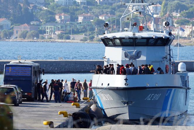 Migrants disembark from a Greek coast vessel after a rescue operation, at the port of Mytilene, on the northeastern Aegean Sea island of Lesbos, Greece, Monday, August 28, 2023. 