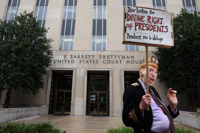 An anti-Trump protester outside a Washington DC courthouse on August 28, 2023.
