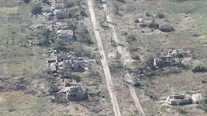 Ukrainian soldiers enter the village of Robotyne, in Ukraine's Zaporizhzhia region, in this screenshot from a video posted on August 25, 2023. 