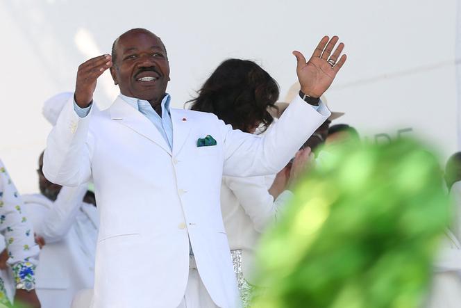 Gabon President Ali Bongo Ondimba gestures at the Nzang Ayong stadium in Libreville on July 10, 2023, a day after he announced that he would seek a third term.
