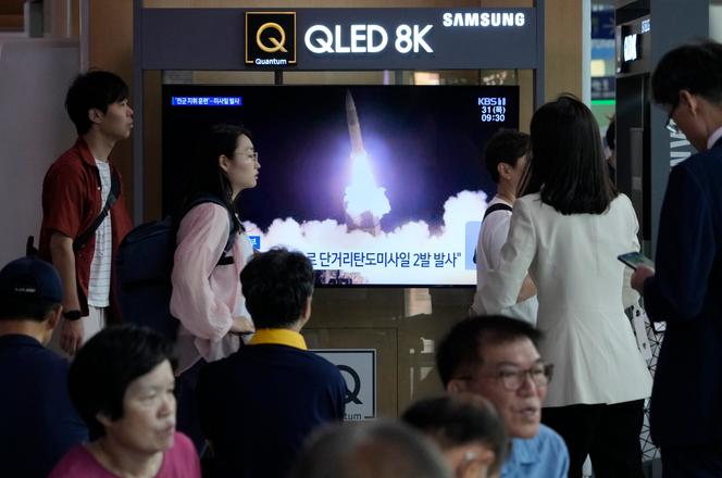 A TV screen shows an image of North Korea's missile launch during a news program at the Seoul Railway Station in Seoul, South Korea, Thursday, August 31, 2023