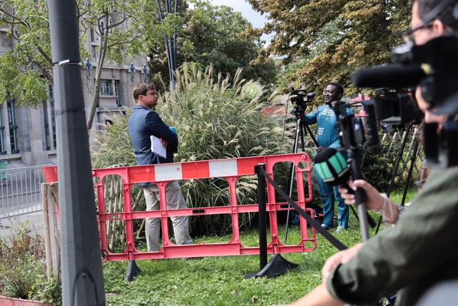 Journalists await the arrival of the leaders of the parties represented in Parliament for a meeting with Emmanuel Macron in Saint-Denis, north of Paris, on August 30, 2023.