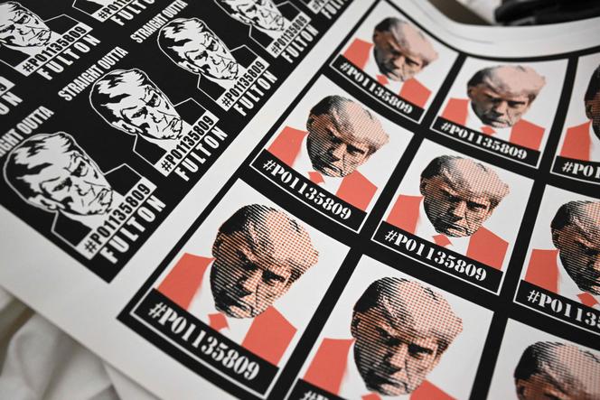 Trump stickers featuring his mug shot are displayed for sale at the Y-Que shop in Los Angeles, California on August 30, 2023. 