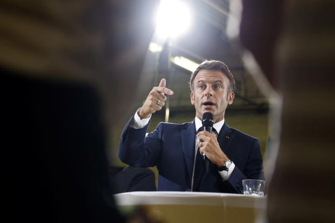French President Emmanuel Macron addresses employees of the Argensol vocational school during his visit in Orange, southeastern France on September 1, 2023.