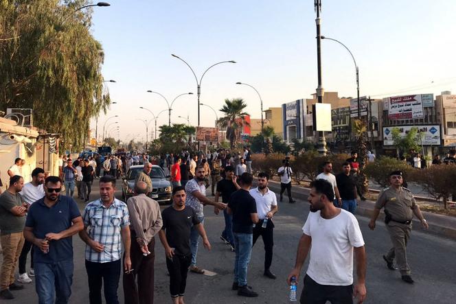 Iraqi protesters block a road following protests in the multi-ethnic Iraqi city of Kirkuk on September 2, 2023. 