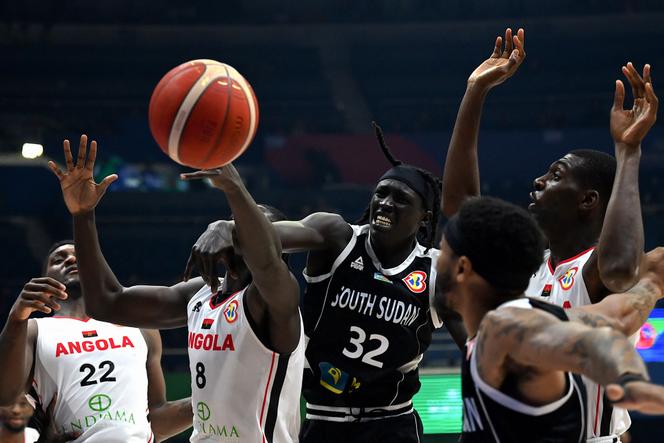 South Sudan’s Wenyen Gabriel blocks the ball during the FIBA Basketball World Cup match between Angola and South Sudan in Quezon City on September 2, 2023.
