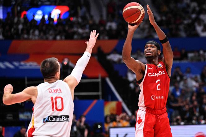Canada’s Shai Gilgeous-Alexander shoots as Victor Claver tries to block during the Basketball World Cup match between Spain and Canada in Jakarta on September 3, 2023.