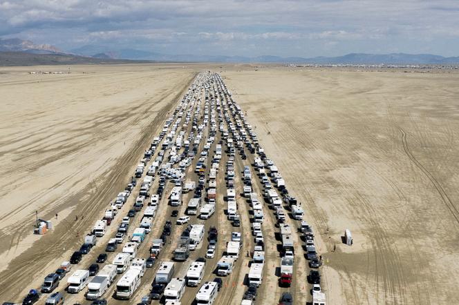 Vehicles are seen departing the Burning Man festival in Black Rock City, Nevada, US, September 4, 2023.