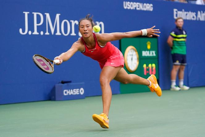Qinwen Zheng of China hits to Ons Jabeur of Tunisia on day eight of the 2023 US Open tennis tournament at USTA Billie Jean King National Tennis Center.
