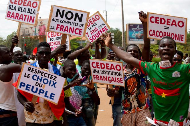 Protest against France and the West African regional bloc known as ECOWAS in the streets of Ouagadougou, Burkina Faso, Oct. 4, 2022.