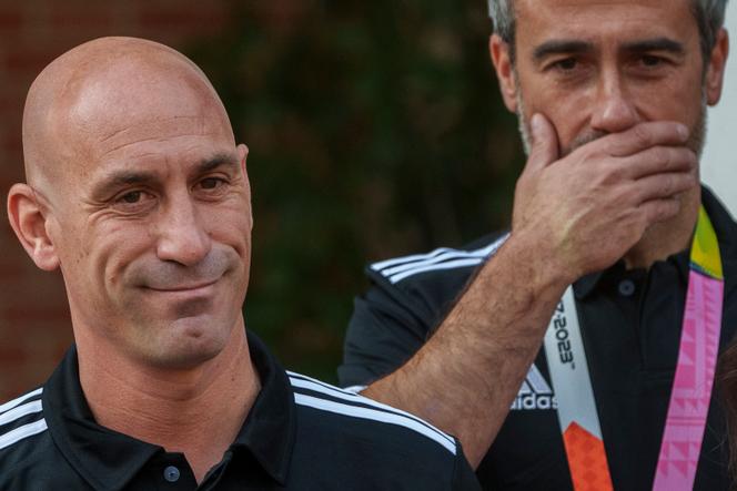 President of Spain's soccer federation, Luis Rubiales, foreground, stands next to Spain Head Coach Jorge Vilda after being received by Spain's Prime Minister Pedro Sanchez at La Moncloa Palace in Madrid, Spain, August 22, 2023. 
