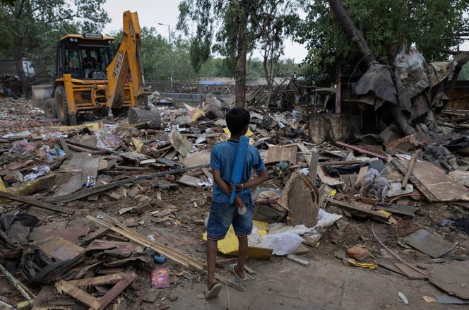 Destruction of a slum adjacent to the exhibition center that will host the G20 summit in New Delhi on June 1, 2023.