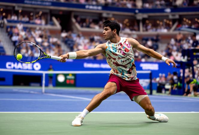 Carlos Alcaraz of Spain returns a shot against Matteo Arnaldi of Italy during their Men's Singles Fourth Round match on Day Eight of the 2023 US Open at the USTA Billie Jean King National Tennis Center on September 04, 2023, in the Flushing neighborhood of the Queens borough of New York City.