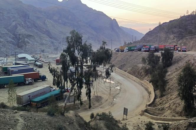 Stranded trucks loaded with supplies for Afghanistan park in a terminal alongside a highway after Afghan Taliban rulers closed a key border crossing point Torkham, in Landi Kotal, an area in Pakistan's district Khyber along the Afghan border, Tuesday, February 21, 2023. 