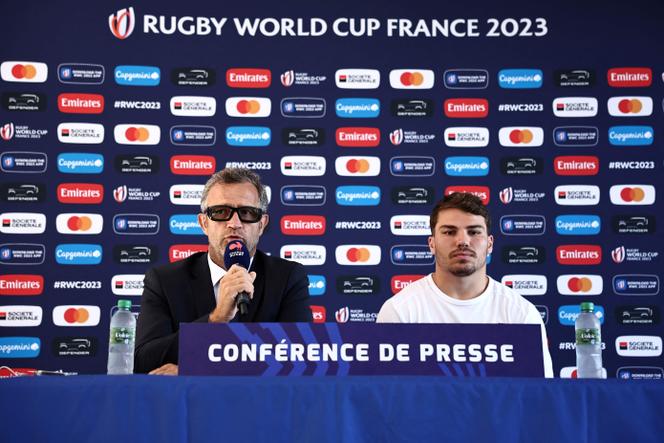 France's head coach Fabien Galthie and France's scrum-half Antoine Dupont take part in a press conference to announce the squad at the Maison de l'Europe, on September 6, 2023, in Rueil-Malamaison, near Paris, ahead of the Rugby World Cup 2023 France. (Photo by Anne-Christine POUJOULAT / AFP)