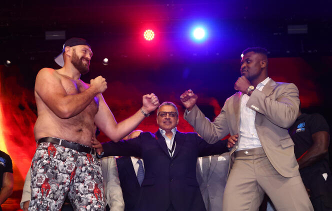 Tyson Fury (left) and Francis Ngannou, during a pre-fight press conference, September 7, 2023, in London.