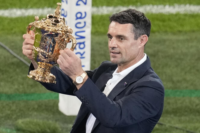 Dan Carter presents the Webb Ellis Trophy, the cup which will be awarded to the winning team of the World Cup, during the opening ceremony of the Rugby World Cup, at the Stade de France, September 8, 2023.