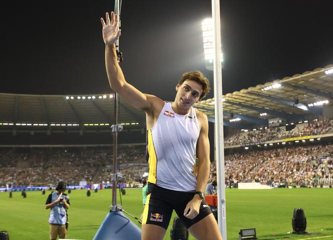 Sweden's Armand Duplantis celebrates winning the men's pole vault.