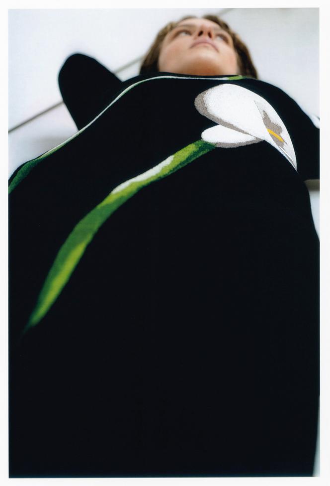     Long black backless dress with jacquard floral print, Lanvin, €2,190.