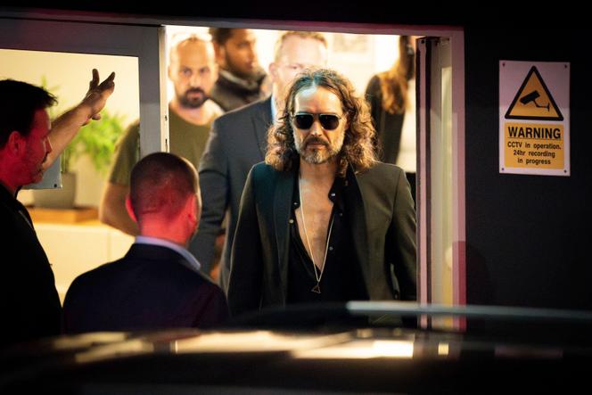 Russell Brand leaves the Troubabour Wembley Park theater in northwest London after performing a comedy set on Saturday, September 16, 2023. 