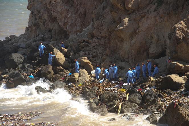 Rescue teams look for flash flood victims in the city of Derna, Libya, September 18, 2023.