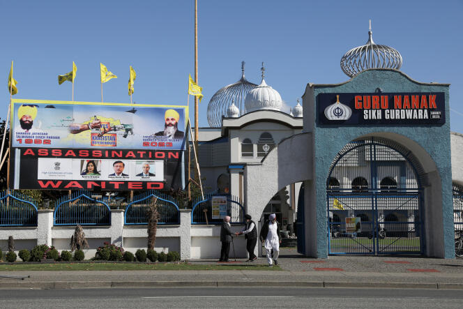 A poster condemns India's role in the killing of Hardeep Singh Nijar outside the Sikh temple he headed in Surrey, British Columbia, September 18, 2023.